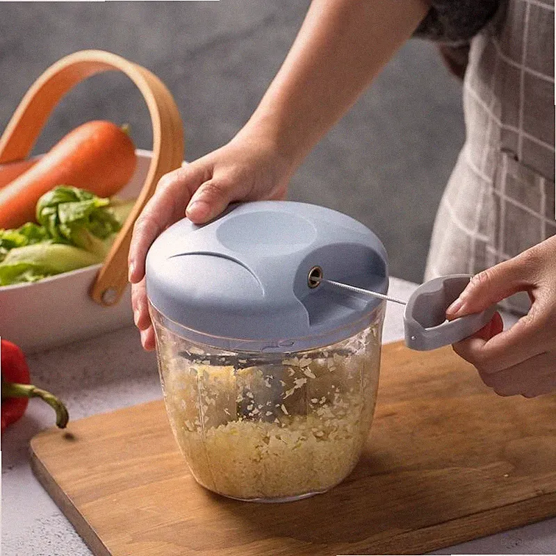 A versatile manual vegetable chopper, equipped with a pull cord and sharp blades
