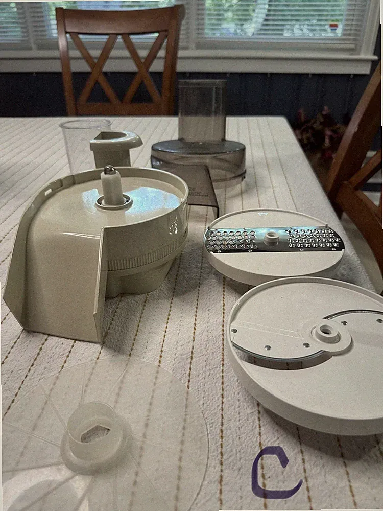 Oster complete kitchen food processor attachment w/ two blades. Grate and slice