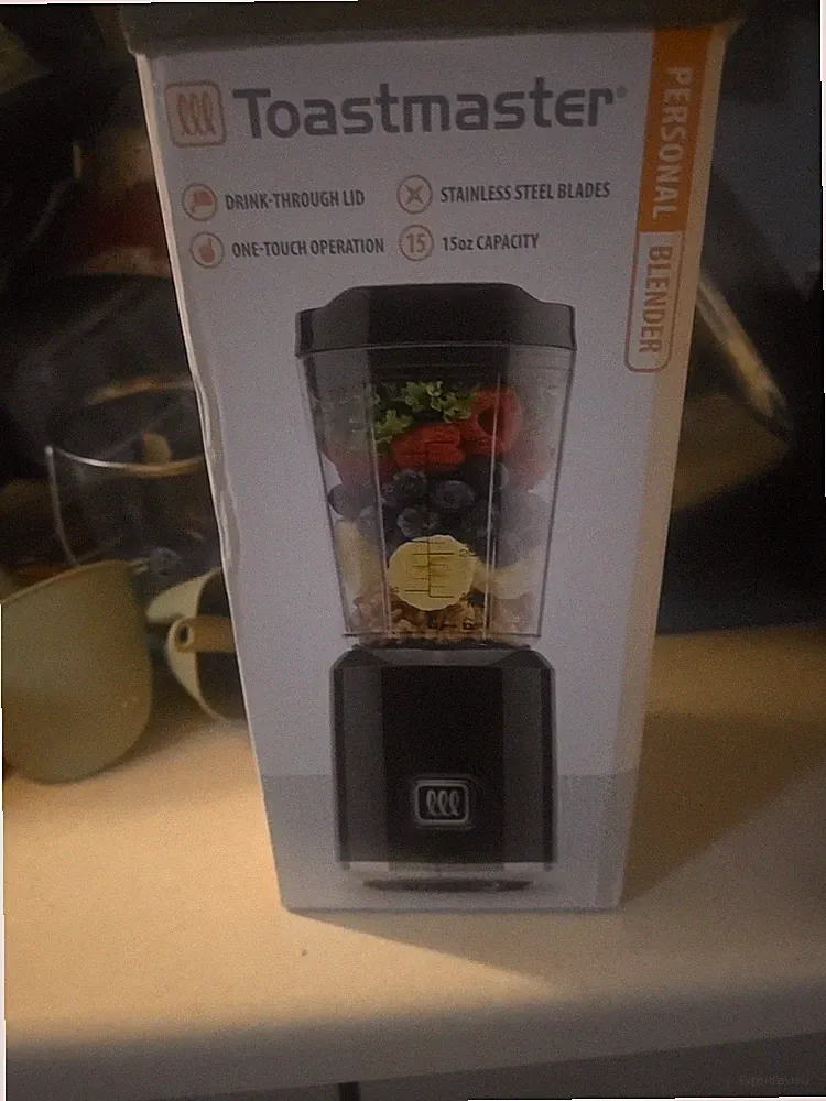 Toastmaster 15 OZ Personal Blender. Drink-thru Lid And Stainless Steel Blades.