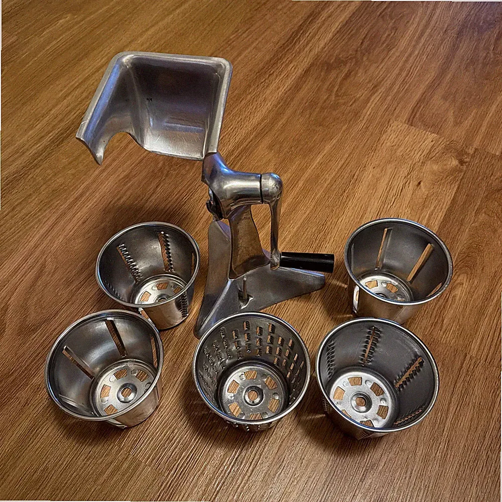 Vintage Kitchen-Quip, Inc. Manual Food Processor with 5 Cones And Suction Base